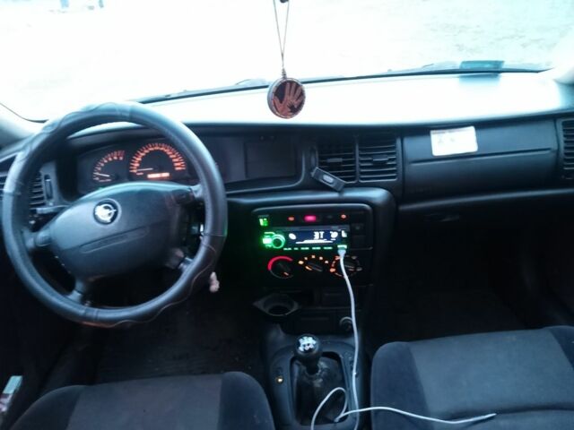 Серый Опель Вектра, объемом двигателя 2 л и пробегом 42 тыс. км за 1898 $, фото 12 на Automoto.ua