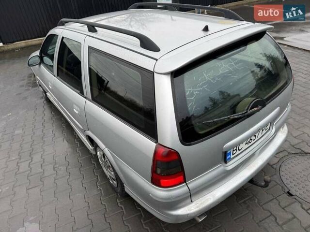 Сірий Опель Вектра, об'ємом двигуна 2 л та пробігом 250 тис. км за 1999 $, фото 25 на Automoto.ua