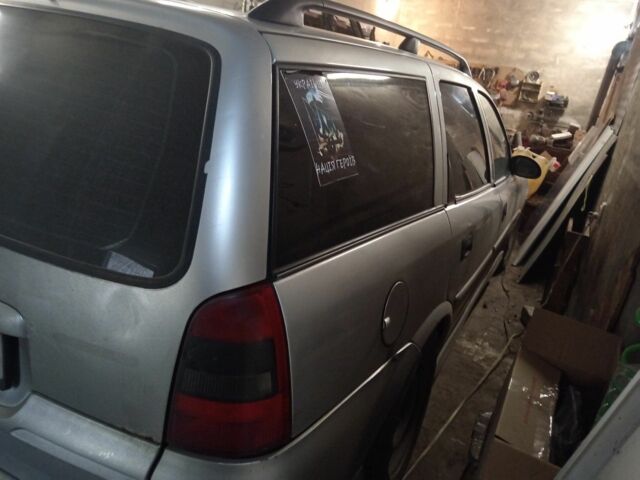 Серый Опель Вектра, объемом двигателя 2 л и пробегом 340 тыс. км за 828 $, фото 5 на Automoto.ua