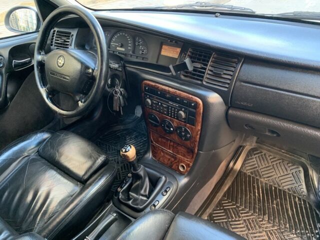 Серый Опель Вектра, объемом двигателя 2.2 л и пробегом 247 тыс. км за 2450 $, фото 13 на Automoto.ua