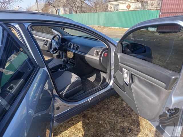 Серый Опель Вектра, объемом двигателя 1.9 л и пробегом 344 тыс. км за 4000 $, фото 6 на Automoto.ua