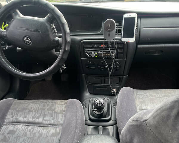 Серый Опель Вектра, объемом двигателя 1.8 л и пробегом 305 тыс. км за 2500 $, фото 7 на Automoto.ua