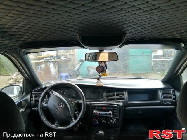 Серый Опель Вектра, объемом двигателя 2 л и пробегом 240 тыс. км за 3500 $, фото 4 на Automoto.ua