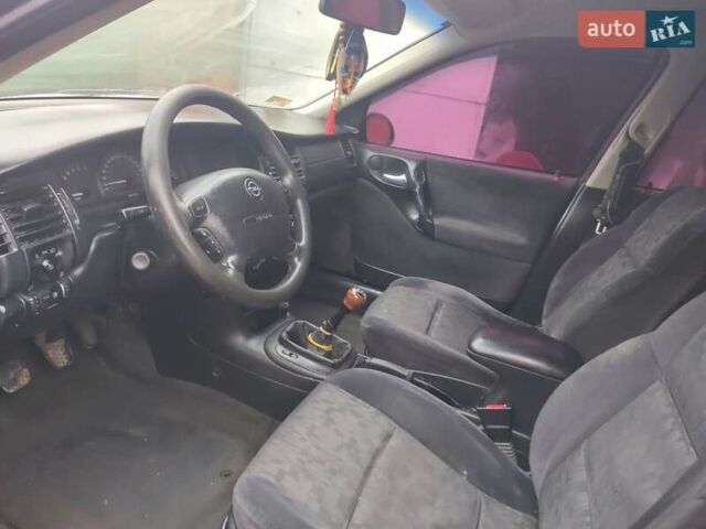 Сірий Опель Вектра, об'ємом двигуна 1.8 л та пробігом 300 тис. км за 1900 $, фото 10 на Automoto.ua