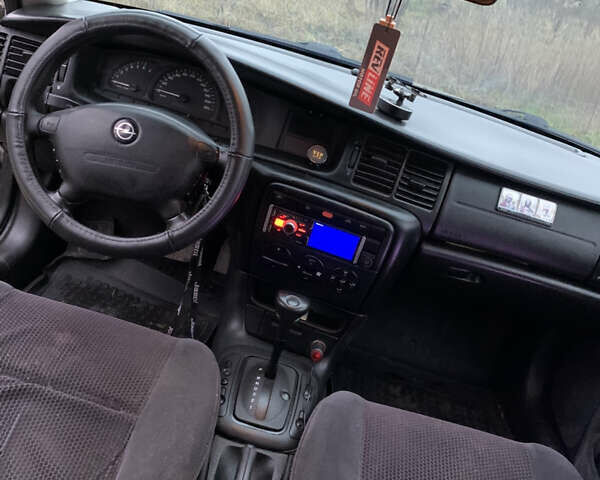 Серый Опель Вектра, объемом двигателя 1.8 л и пробегом 299 тыс. км за 2599 $, фото 6 на Automoto.ua