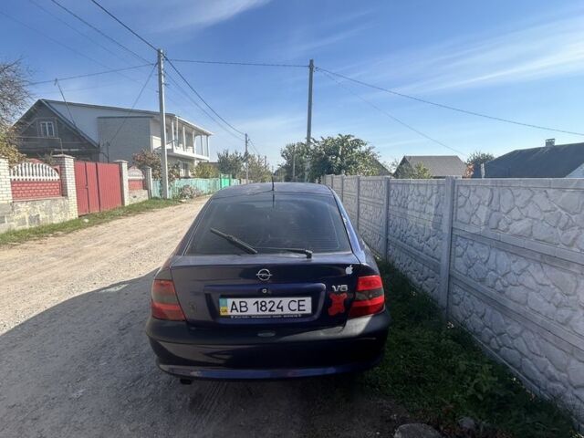 Синій Опель Вектра, об'ємом двигуна 2.5 л та пробігом 254 тис. км за 1908 $, фото 4 на Automoto.ua