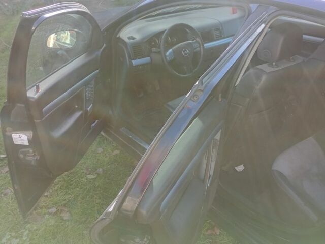 Синий Опель Вектра, объемом двигателя 2.2 л и пробегом 370 тыс. км за 700 $, фото 3 на Automoto.ua