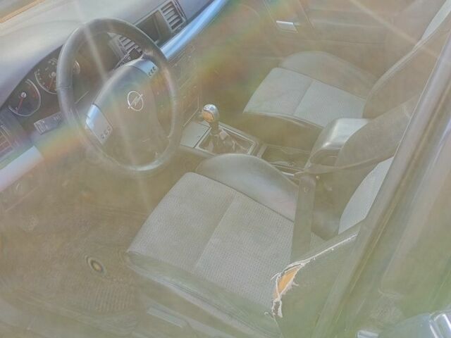 Синий Опель Вектра, объемом двигателя 2.2 л и пробегом 370 тыс. км за 700 $, фото 1 на Automoto.ua