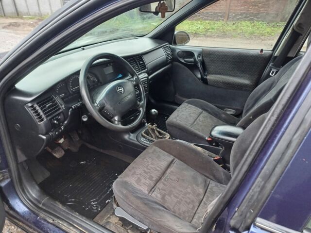 Синий Опель Вектра, объемом двигателя 2 л и пробегом 350 тыс. км за 750 $, фото 13 на Automoto.ua