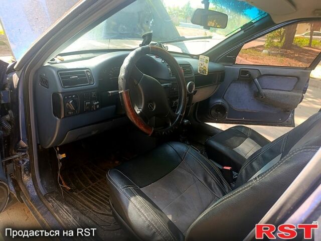 Синий Опель Вектра, объемом двигателя 2 л и пробегом 248 тыс. км за 1500 $, фото 3 на Automoto.ua