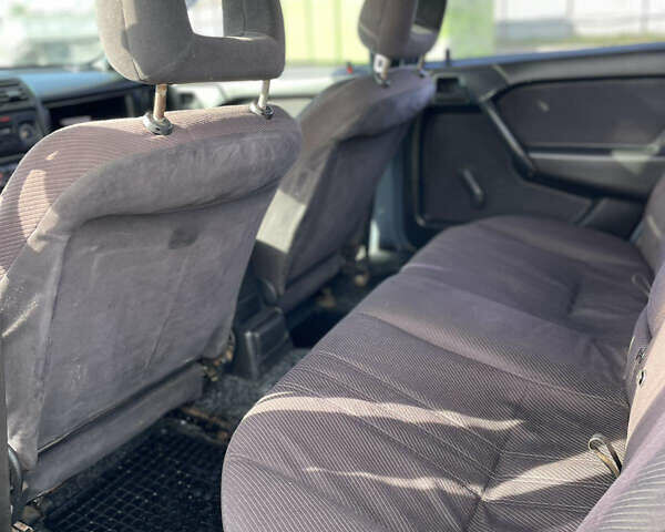 Синий Опель Вектра, объемом двигателя 2 л и пробегом 407 тыс. км за 1350 $, фото 12 на Automoto.ua
