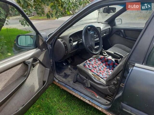 Синій Опель Вектра, об'ємом двигуна 2.2 л та пробігом 225 тис. км за 701 $, фото 7 на Automoto.ua