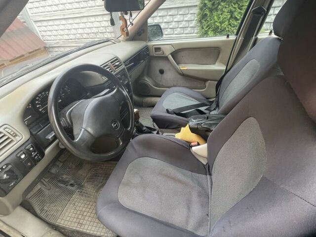 Синій Опель Вектра, об'ємом двигуна 1.8 л та пробігом 425 тис. км за 1000 $, фото 6 на Automoto.ua