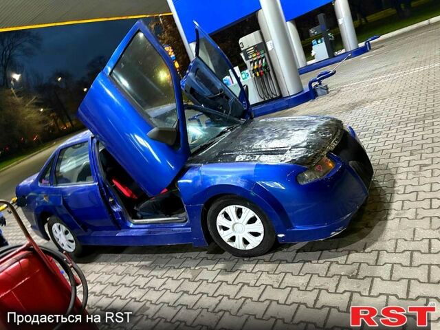 Синій Опель Вектра, об'ємом двигуна 2 л та пробігом 200 тис. км за 2000 $, фото 1 на Automoto.ua