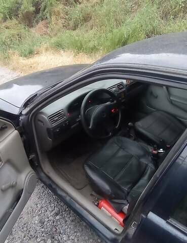 Синий Опель Вектра, объемом двигателя 1.77 л и пробегом 470 тыс. км за 2000 $, фото 3 на Automoto.ua