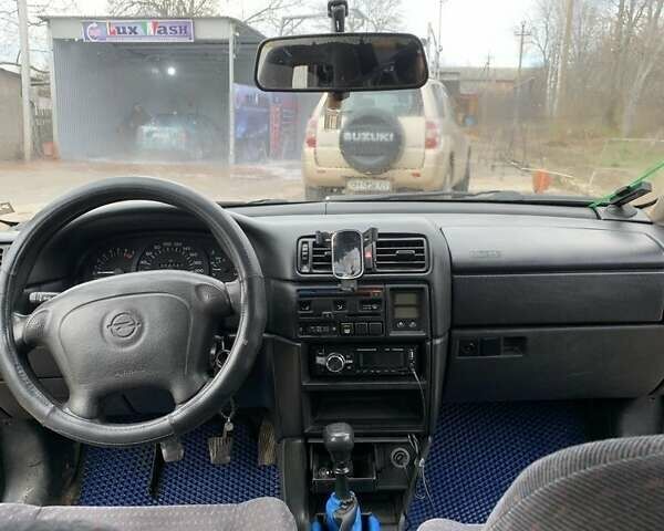 Синий Опель Вектра, объемом двигателя 1.8 л и пробегом 300 тыс. км за 1600 $, фото 6 на Automoto.ua