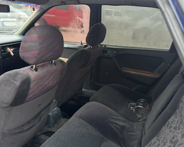 Синій Опель Вектра, об'ємом двигуна 1.8 л та пробігом 235 тис. км за 1900 $, фото 7 на Automoto.ua