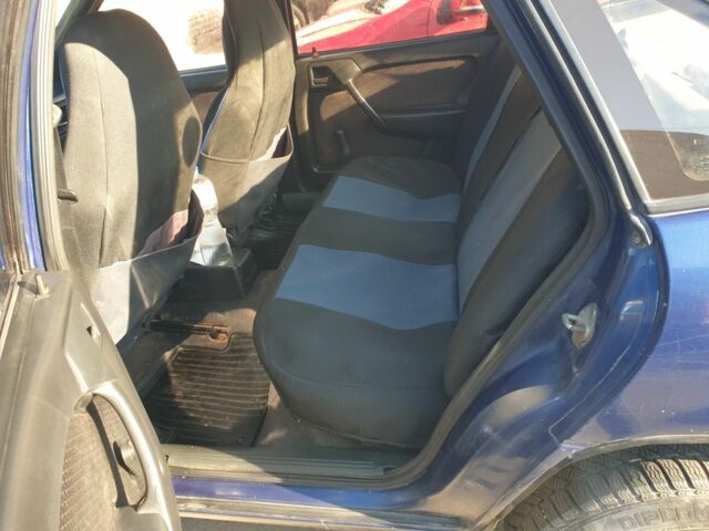 Синий Опель Вектра, объемом двигателя 2 л и пробегом 350 тыс. км за 1099 $, фото 4 на Automoto.ua