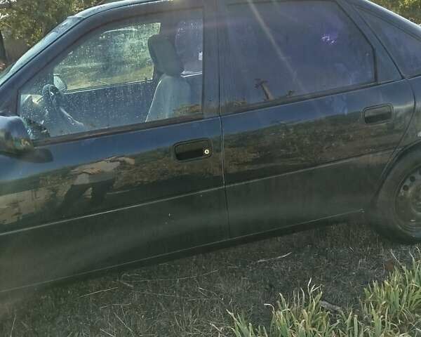 Синий Опель Вектра, объемом двигателя 1.8 л и пробегом 812 тыс. км за 900 $, фото 2 на Automoto.ua