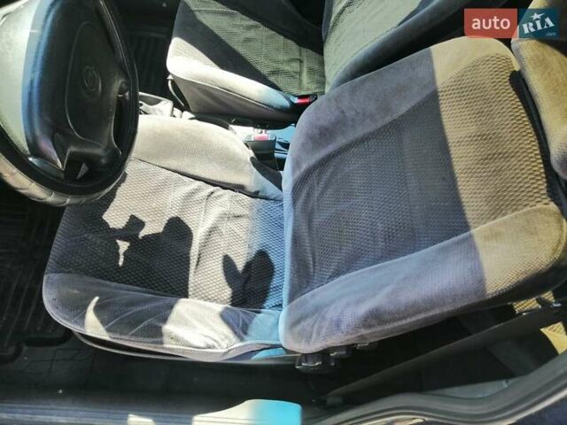 Синий Опель Вектра, объемом двигателя 2 л и пробегом 380 тыс. км за 1700 $, фото 2 на Automoto.ua