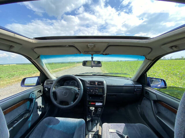 Синий Опель Вектра, объемом двигателя 2.5 л и пробегом 247 тыс. км за 2000 $, фото 6 на Automoto.ua