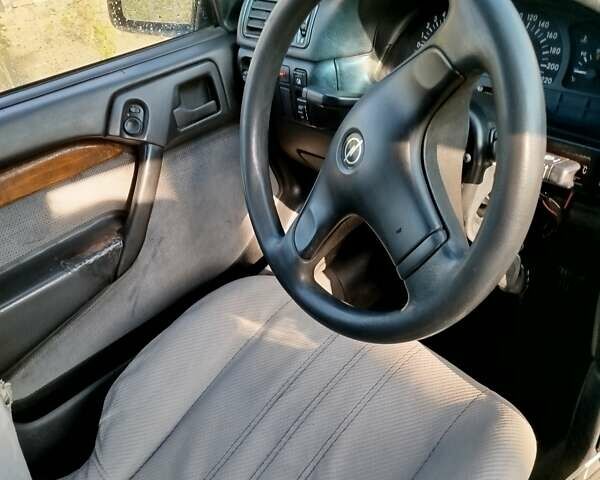 Синий Опель Вектра, объемом двигателя 1.8 л и пробегом 812 тыс. км за 900 $, фото 3 на Automoto.ua