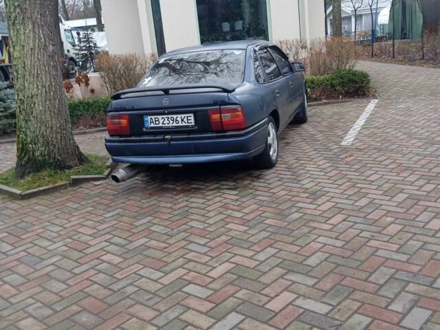 Синий Опель Вектра, объемом двигателя 1.8 л и пробегом 205 тыс. км за 900 $, фото 1 на Automoto.ua