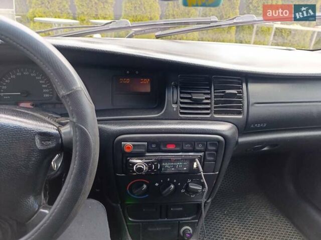 Синий Опель Вектра, объемом двигателя 1.8 л и пробегом 264 тыс. км за 1700 $, фото 6 на Automoto.ua