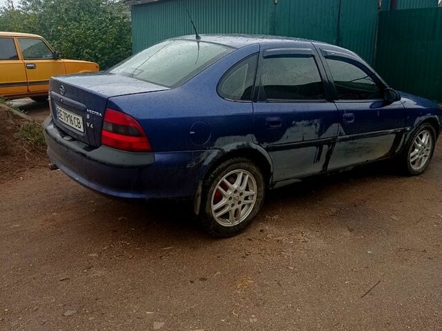 Синій Опель Вектра, об'ємом двигуна 2 л та пробігом 250 тис. км за 1000 $, фото 1 на Automoto.ua