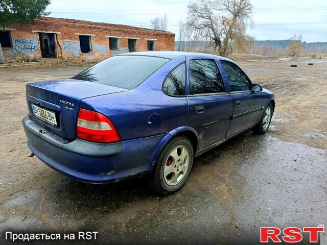 Синий Опель Вектра, объемом двигателя 1.6 л и пробегом 233 тыс. км за 2350 $, фото 2 на Automoto.ua