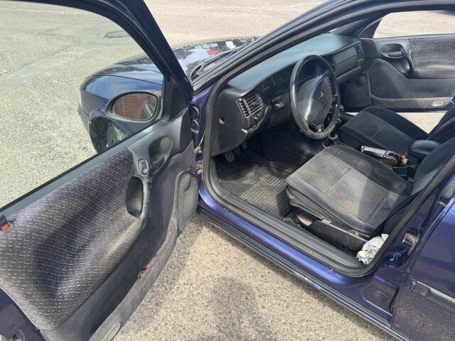 Синій Опель Вектра, об'ємом двигуна 1.8 л та пробігом 247 тис. км за 1999 $, фото 3 на Automoto.ua