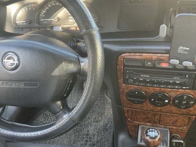 Синий Опель Вектра, объемом двигателя 2 л и пробегом 300 тыс. км за 1800 $, фото 10 на Automoto.ua