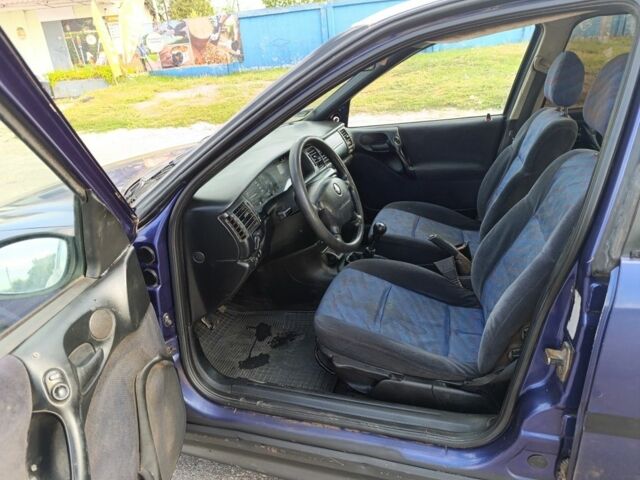 Синий Опель Вектра, объемом двигателя 1.7 л и пробегом 295 тыс. км за 1200 $, фото 6 на Automoto.ua