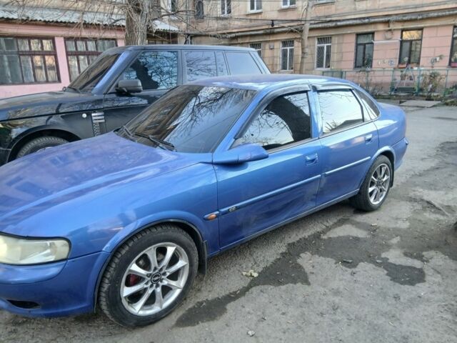 Синий Опель Вектра, объемом двигателя 1.8 л и пробегом 220 тыс. км за 2600 $, фото 2 на Automoto.ua