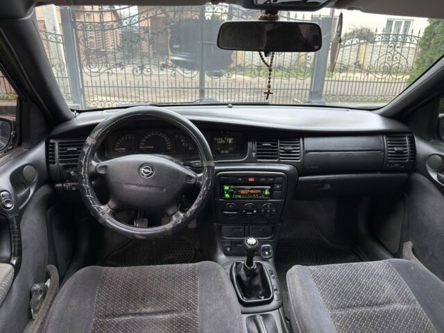 Синий Опель Вектра, объемом двигателя 2 л и пробегом 240 тыс. км за 2300 $, фото 6 на Automoto.ua