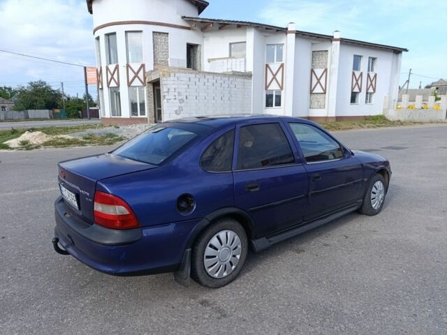 Синий Опель Вектра, объемом двигателя 1.7 л и пробегом 295 тыс. км за 1200 $, фото 9 на Automoto.ua