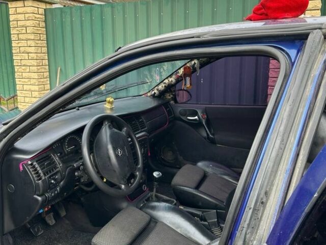 Синий Опель Вектра, объемом двигателя 2.5 л и пробегом 330 тыс. км за 2800 $, фото 7 на Automoto.ua