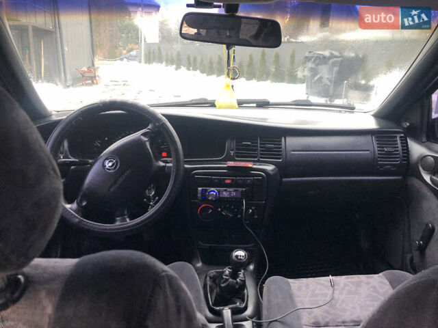 Синий Опель Вектра, объемом двигателя 1.6 л и пробегом 222 тыс. км за 2000 $, фото 7 на Automoto.ua