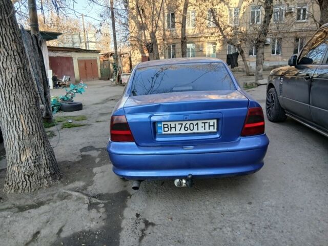 Синий Опель Вектра, объемом двигателя 1.8 л и пробегом 220 тыс. км за 2600 $, фото 6 на Automoto.ua