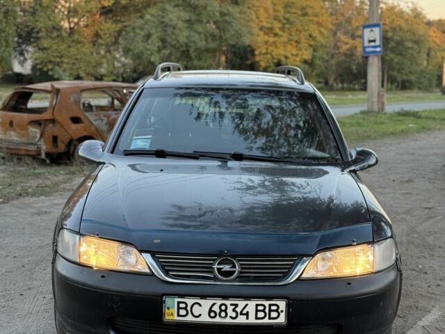 Синий Опель Вектра, объемом двигателя 1.8 л и пробегом 300 тыс. км за 1254 $, фото 1 на Automoto.ua