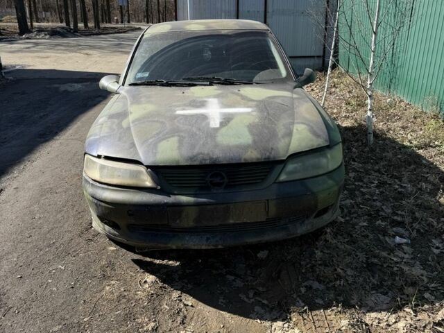 Синий Опель Вектра, объемом двигателя 2 л и пробегом 250 тыс. км за 750 $, фото 1 на Automoto.ua