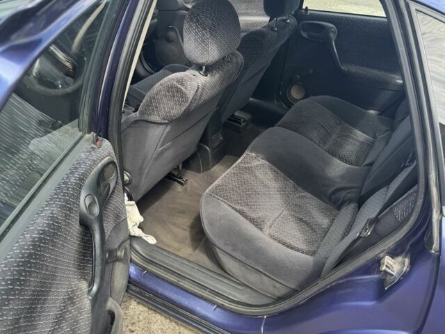 Синій Опель Вектра, об'ємом двигуна 1.8 л та пробігом 247 тис. км за 1999 $, фото 4 на Automoto.ua