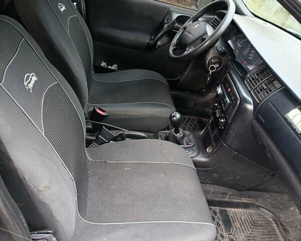 Синій Опель Вектра, об'ємом двигуна 1.8 л та пробігом 400 тис. км за 1250 $, фото 10 на Automoto.ua