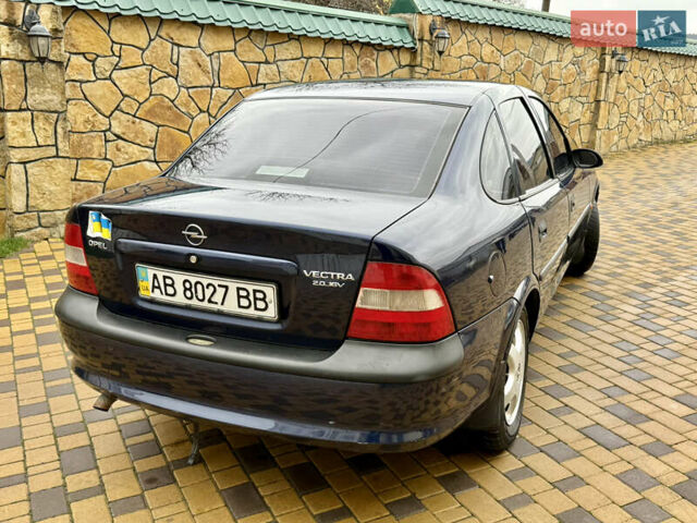 Синій Опель Вектра, об'ємом двигуна 2 л та пробігом 248 тис. км за 2550 $, фото 14 на Automoto.ua