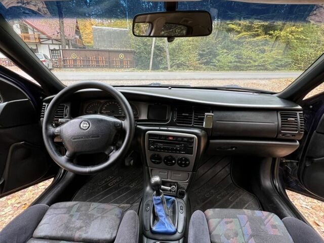 Синий Опель Вектра, объемом двигателя 1.8 л и пробегом 479 тыс. км за 1600 $, фото 14 на Automoto.ua