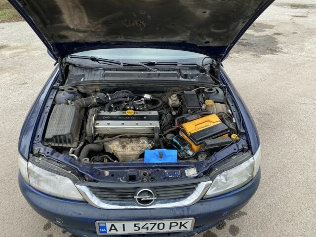 Синий Опель Вектра, объемом двигателя 1.8 л и пробегом 100 тыс. км за 1750 $, фото 12 на Automoto.ua