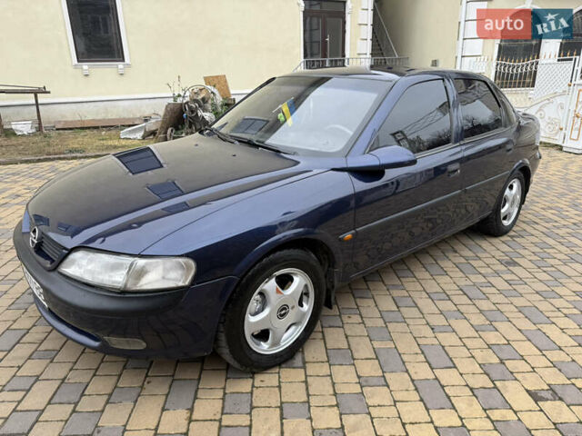 Синій Опель Вектра, об'ємом двигуна 2 л та пробігом 248 тис. км за 2550 $, фото 25 на Automoto.ua