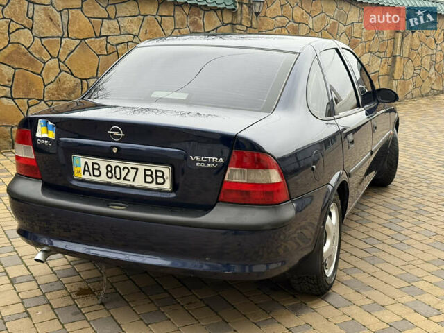 Синій Опель Вектра, об'ємом двигуна 2 л та пробігом 248 тис. км за 2550 $, фото 12 на Automoto.ua
