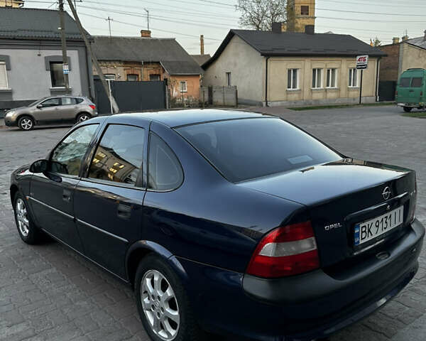 Синій Опель Вектра, об'ємом двигуна 2 л та пробігом 257 тис. км за 3100 $, фото 5 на Automoto.ua