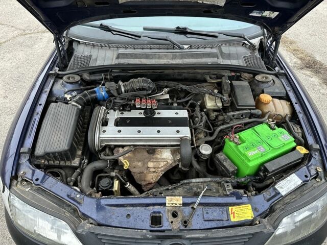 Синий Опель Вектра, объемом двигателя 2 л и пробегом 300 тыс. км за 1600 $, фото 4 на Automoto.ua